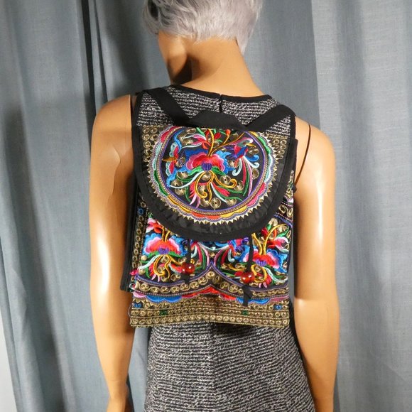 Pretty small lightweight embroidered backpack